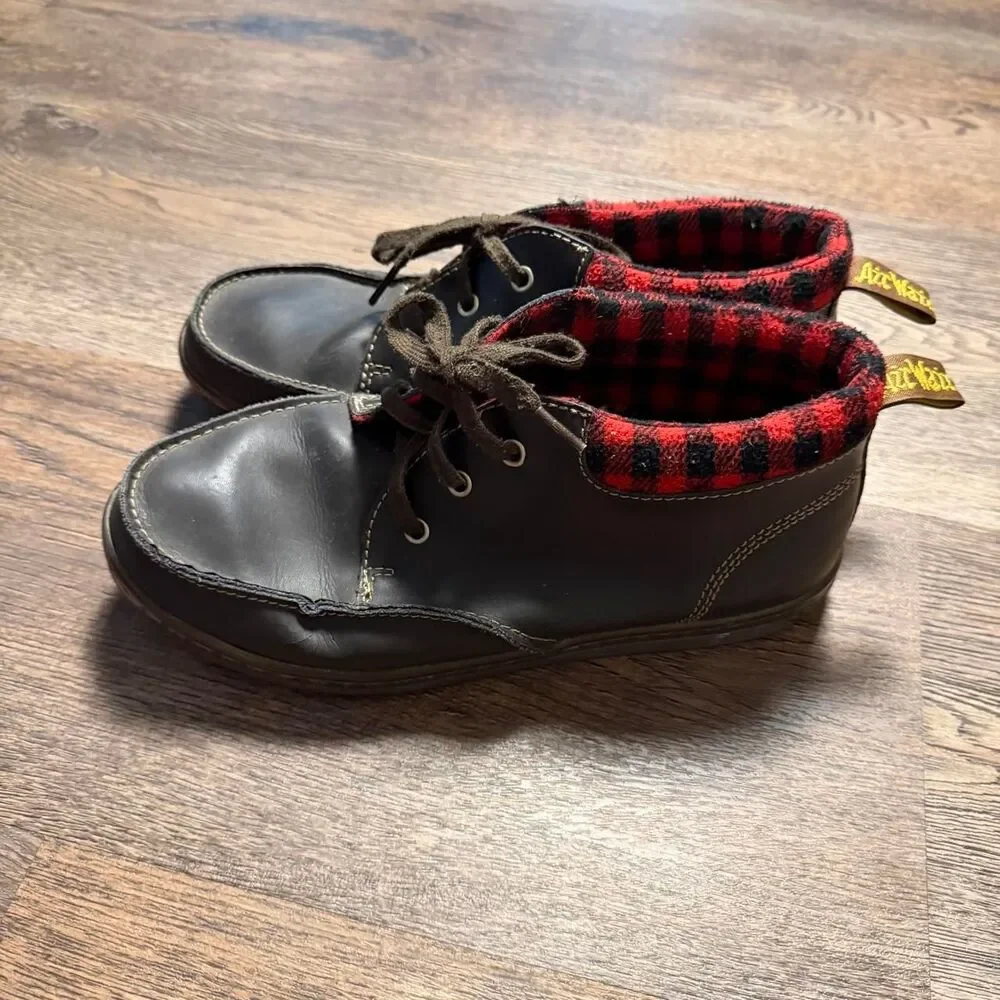 Dr. Martens black leather lace up boots with red/black plaid lining, size US 10